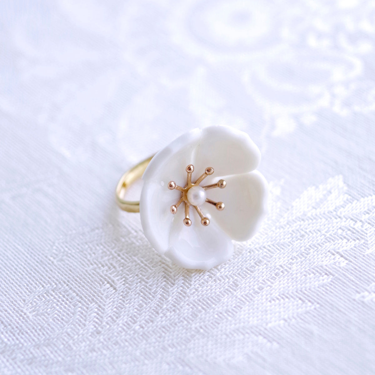 Snow-White Porcelain Plum Blossom Ring - YuppyCollections