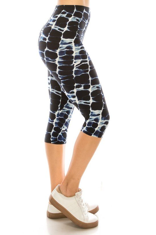 Abstract Print, High Waisted Capri Leggings In A Fitted Style With An Elastic Waistband. - YuppyCollections