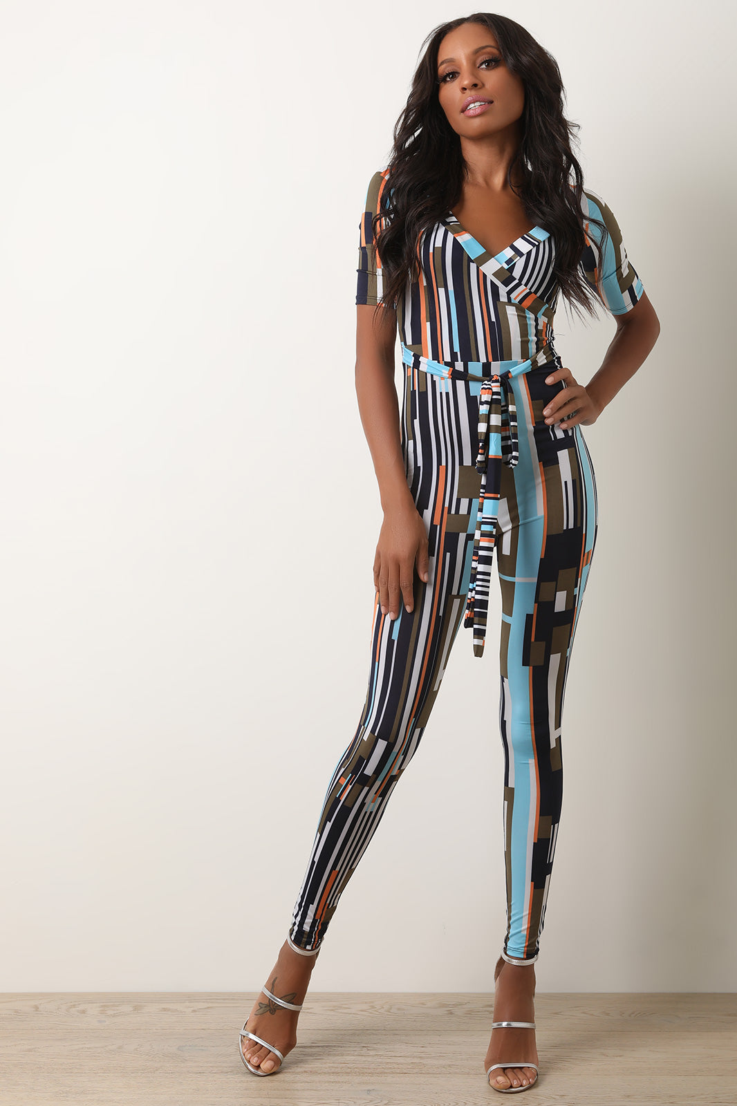 Geo Pattern Surplice Waist Tie Jumpsuit - YuppyCollections