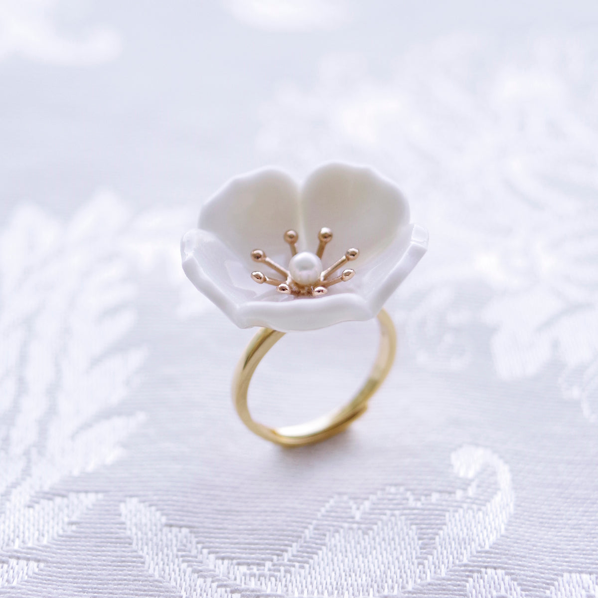 Snow-White Porcelain Plum Blossom Ring - YuppyCollections