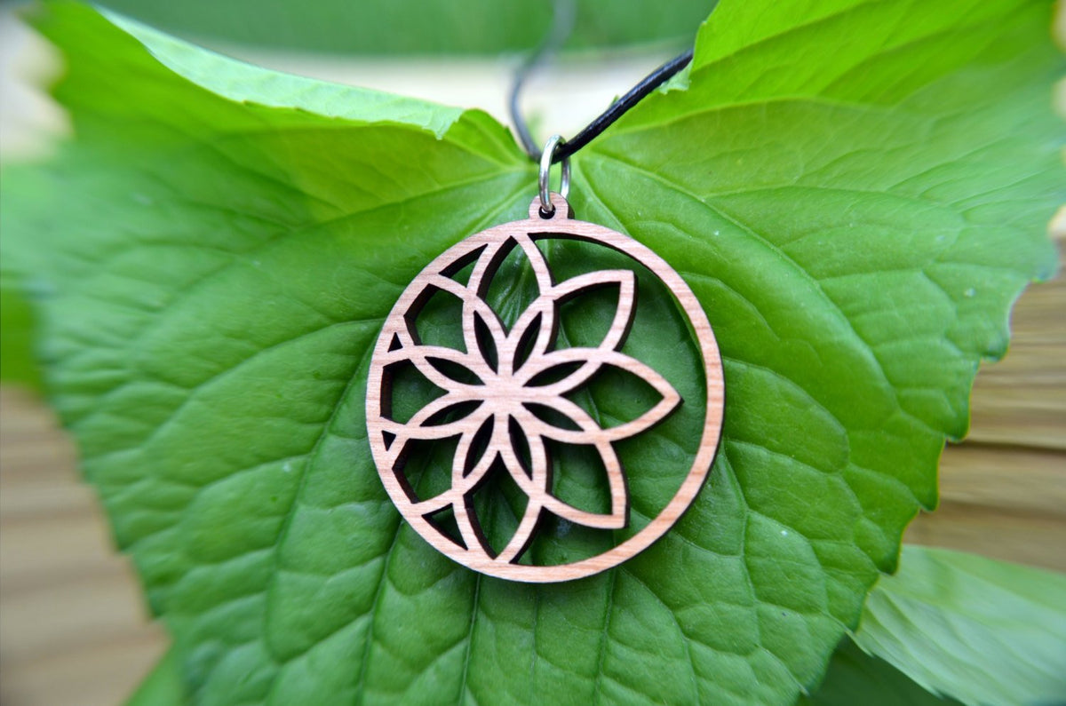 Lotus Flower Circle Pendant in cherry on leather cord - YuppyCollections